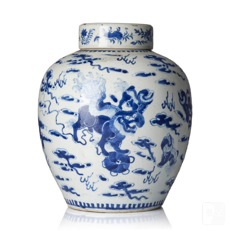 A blue and white jar with cover,